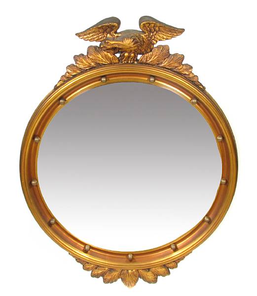 Appraisal: A Federal style carved giltwood convex mirror height in diameter