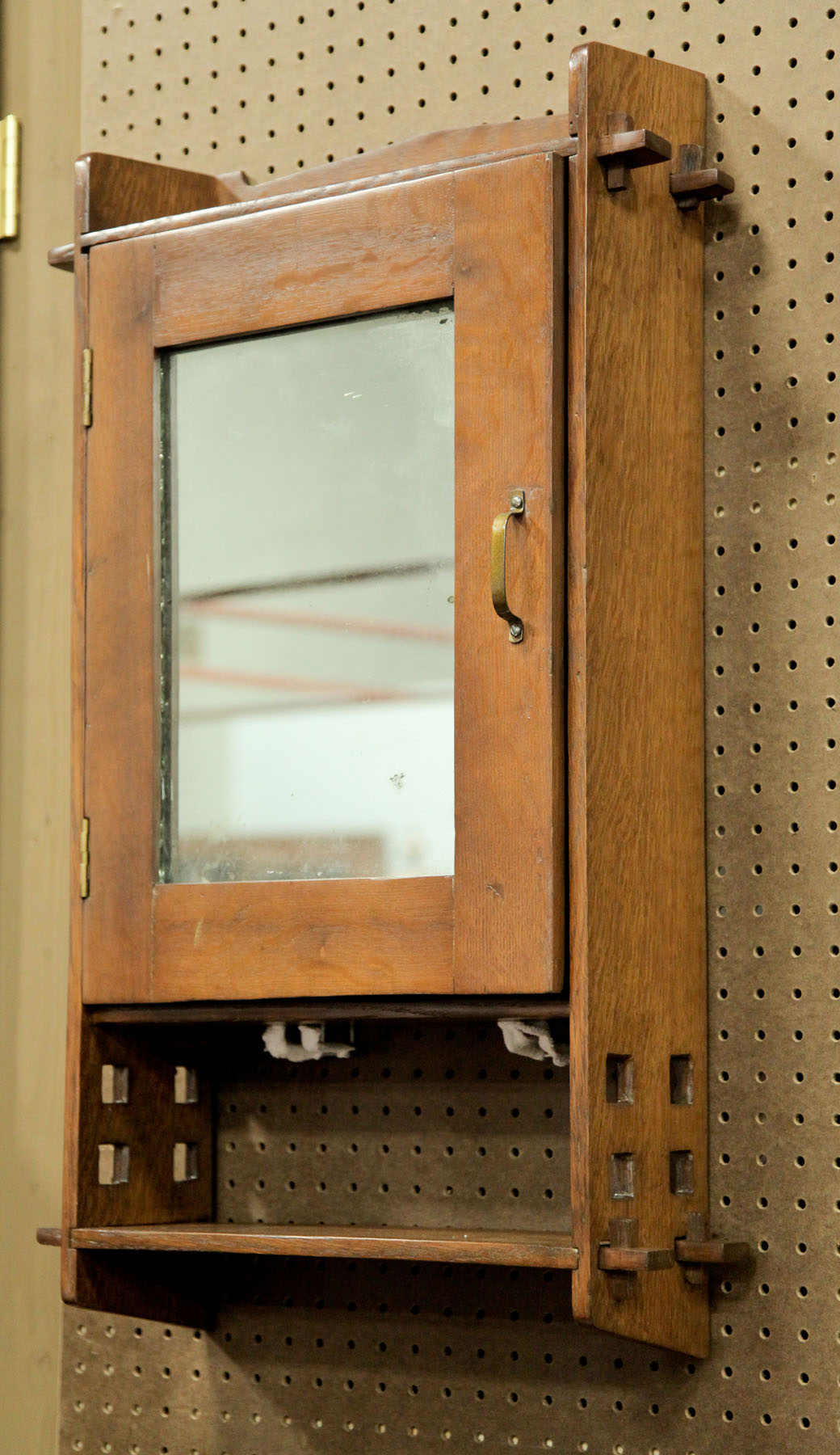 Appraisal: ARTS CRAFTS HANGING CUPBOARD American early th century Oak having