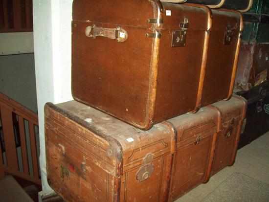 Appraisal: TWO LARGE WOODEN METAL BOUND TRAVELLING TRUNKS