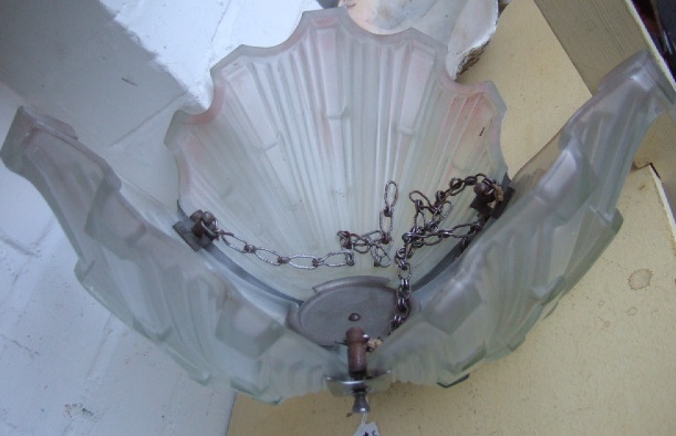 Appraisal: A 's moulded glass and chromed metal hanging ceiling light