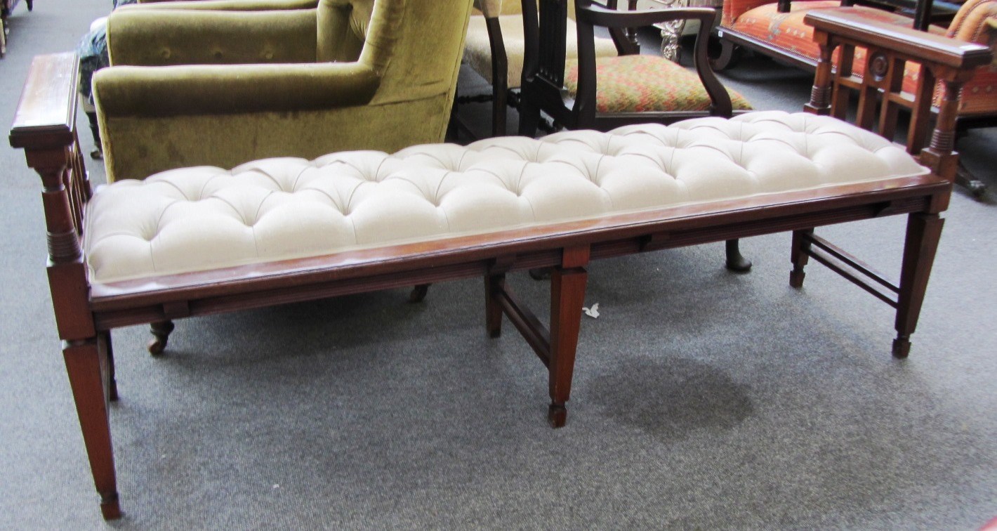 Appraisal: An early th century Aesthetic design mahogany hall bench on