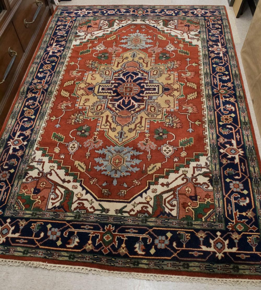 Appraisal: HAND KNOTTED ORIENTAL CARPET Persian Serapi or Heriz design '