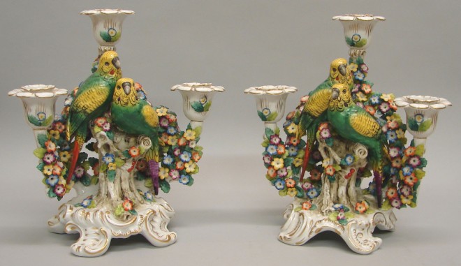 Appraisal: Pair of three branch candleabra feature two parrots perched among