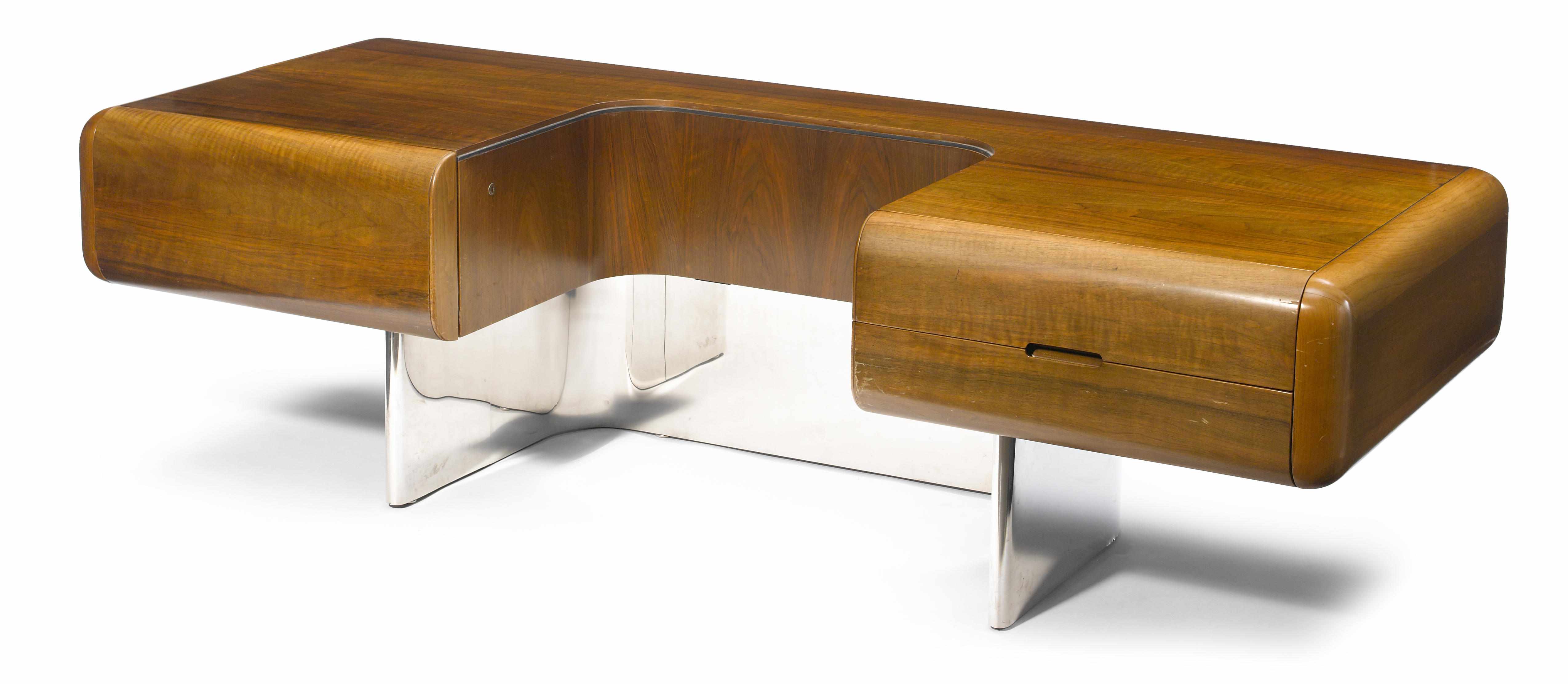 Appraisal: A Stow Davis walnut and stainless steel desk designed by