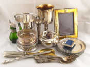 Appraisal: A quantity of silver plate including wine coasters photo frames