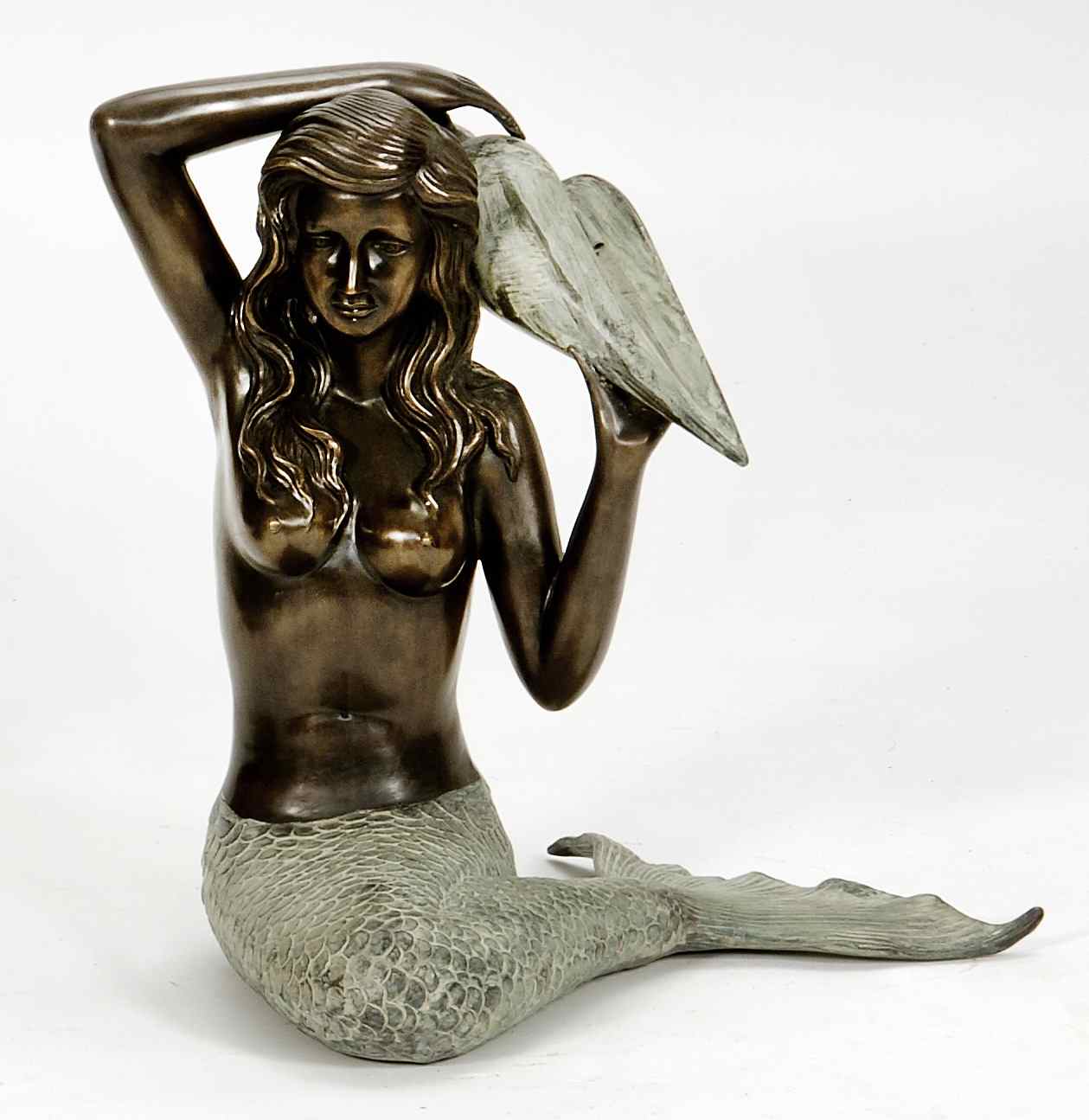 Appraisal: BRONZE FOUNTAINLate th CenturyIn the form of a mermaid holding