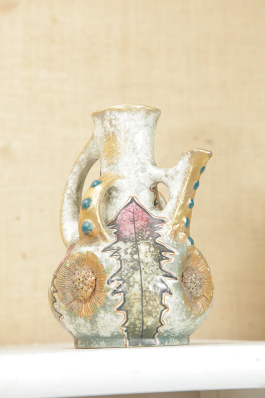 Appraisal: AMPHORA PITCHER Naive foliate decoration with gilt targets and blue