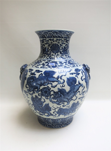 Appraisal: CHINESE BLUE UNDERGLAZE PORCELAIN VASE Ching Dynasty molded lion and