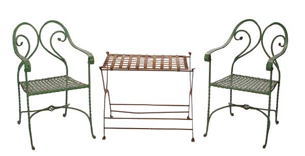 Appraisal: A pair of paint decorated wrought metal armchairs together with