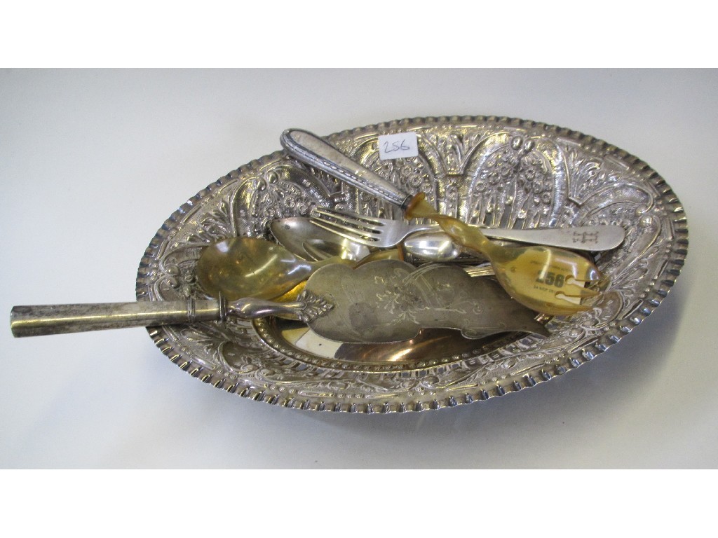 Appraisal: Lot comprising embossed white metal dish and some loose cutlery