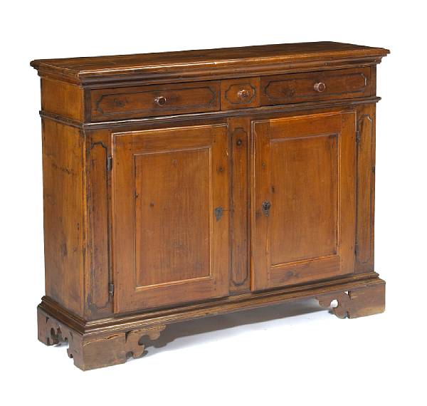 Appraisal: A Tuscan Baroque style walnut credenza partially incorporating th century