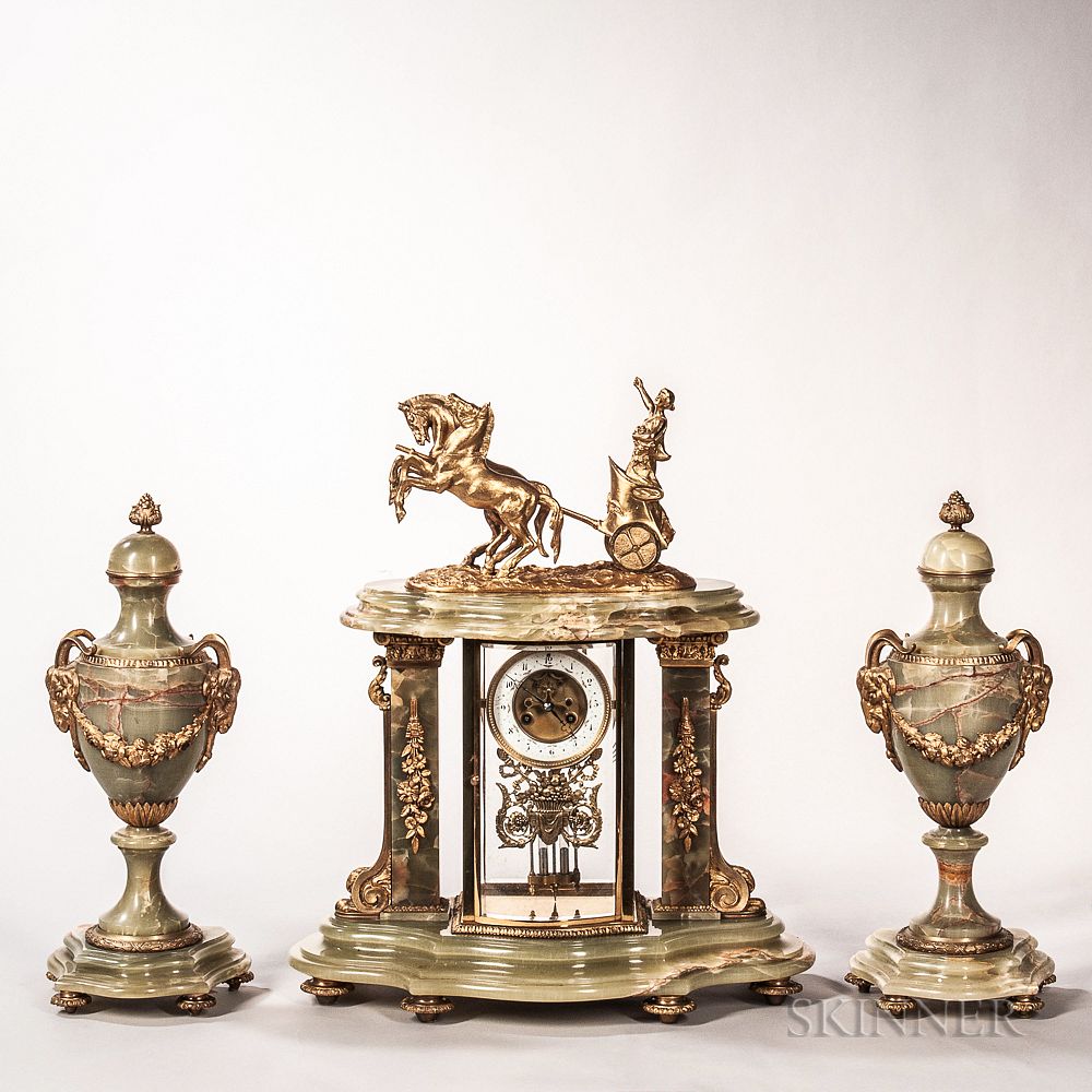 Appraisal: Three-piece Onyx Clock Garniture Three-piece Onyx Clock Garniture France th