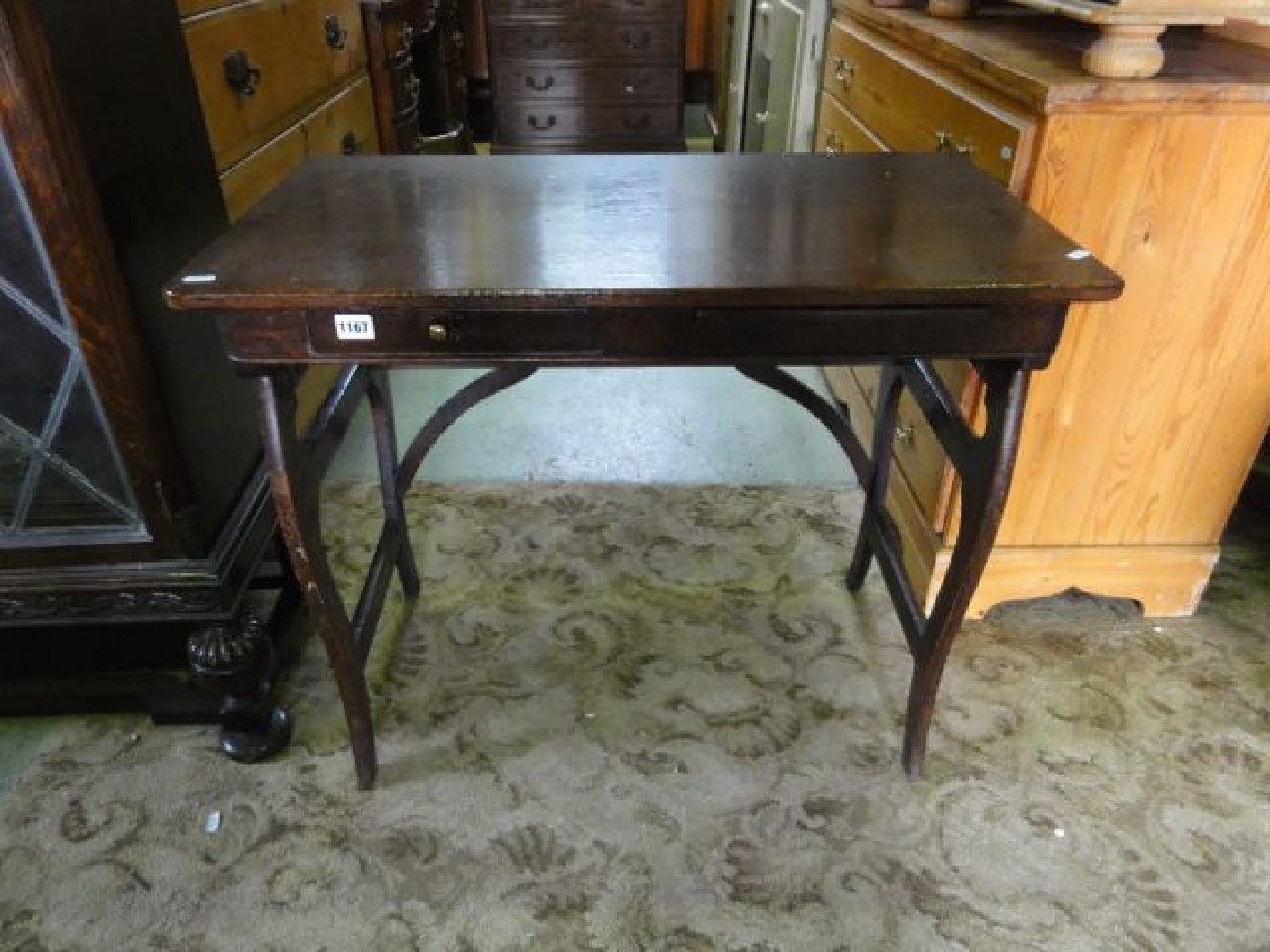 Appraisal: An Arts and Crafts style stained oak side table with