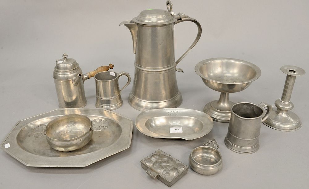 Appraisal: Pewter lot including large beaker compote plates and mugs candlesticks