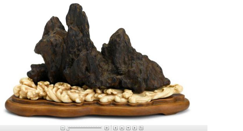 Appraisal: Chinese carved eaglewood mountain on elephant ivory baseqianlong mark to