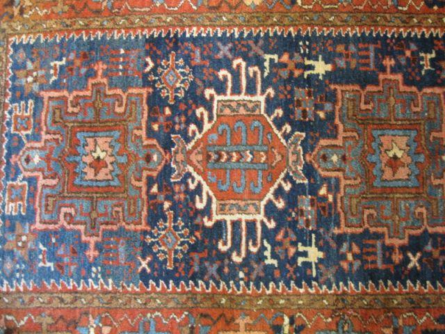 Appraisal: Heriz Persian Handmade Rug triple geometric medallion ' x '