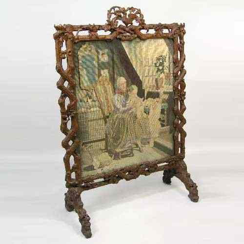 Appraisal: A Swedish Faux Bois Needlepoint Fireplace Screen circa depicting a