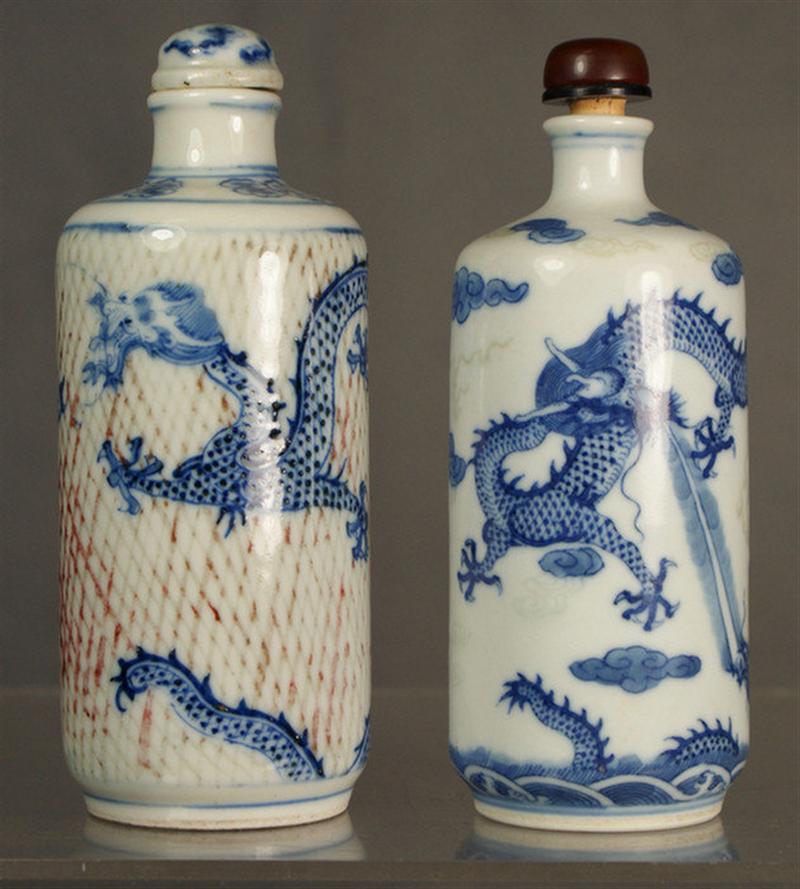 Appraisal: Cylindrical porcelain snuff bottles each with blue underglaze dragon seeking