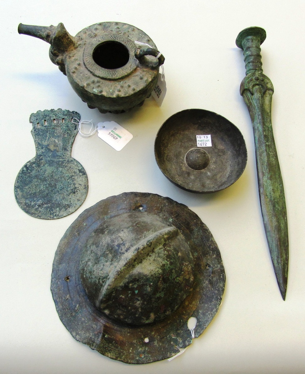 Appraisal: A group of Near Eastern bronze artefacts including a Luristan