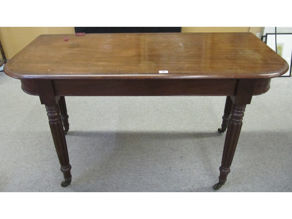 Appraisal: Victorian mahogany D ended table section raised on fluted spindle