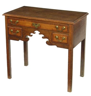 Appraisal: A George III oak side table with mahogany banding and