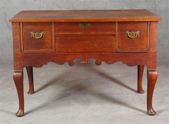 Appraisal: English Edwardian Lowboy Circa Oak Molded two board top over