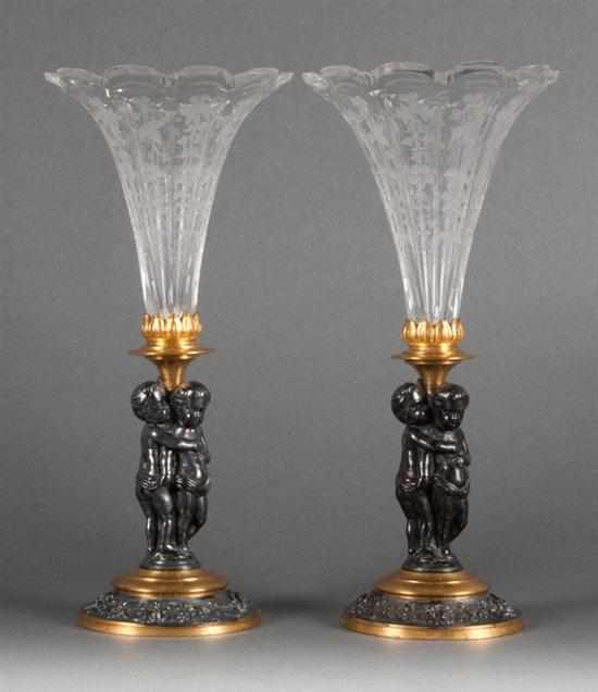 Appraisal: Pair of Continental brass and patinated metal figural vases with