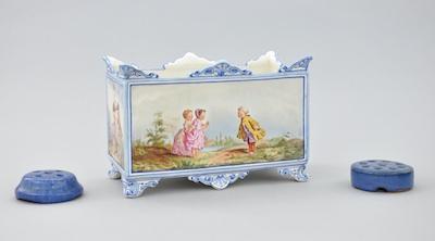 Appraisal: A French Faience Jardinaire Of rectangular form with scrolling feet