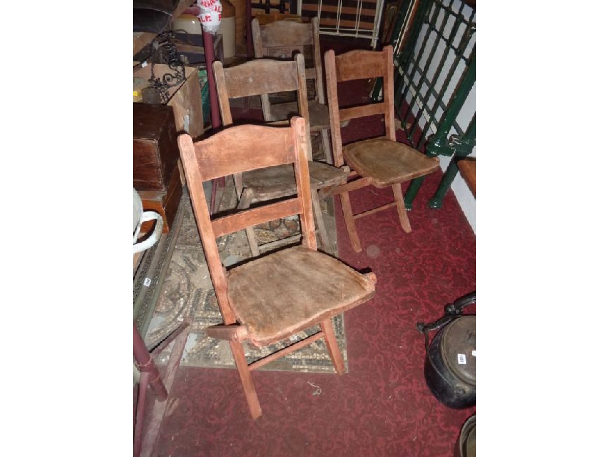 Appraisal: A set of four vintage folding hall school chairs with