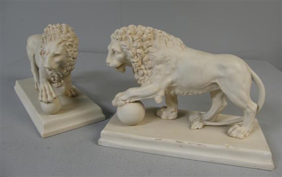 Appraisal: Pair of th century Parian ware lions their front paws