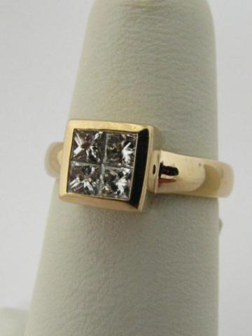 Appraisal: k yellow gold quadrillion set diamond ring containing four princess