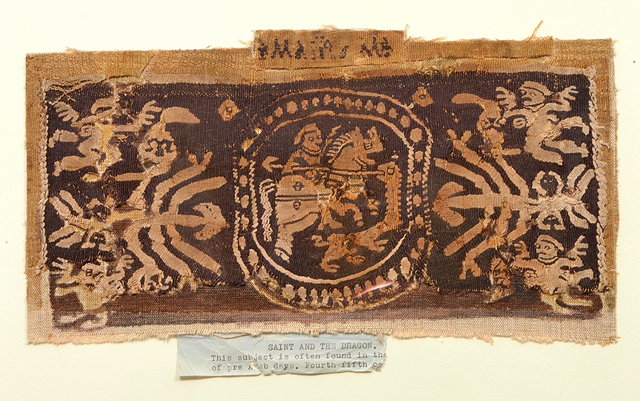 Appraisal: A RECTANGULAR TAPESTRY PANEL portraying St George and The Dragon