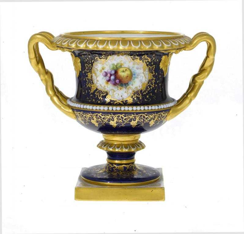 Appraisal: A ROYAL WORCESTER COBALT GROUND VASE of Warwick shape painted