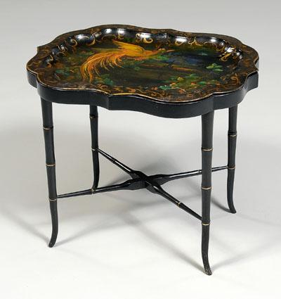 Appraisal: Painted tole tray table cartouche-form top painted with tropical bird