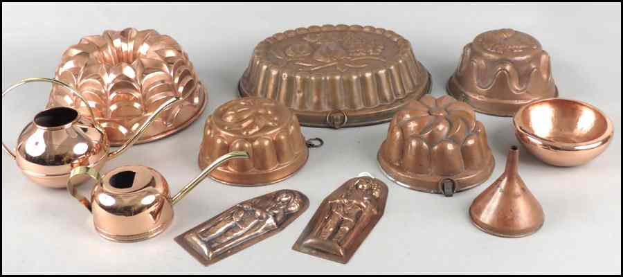 Appraisal: FIVE ANTIQUE COPPER MOLDS Together with a copper chocolate mold