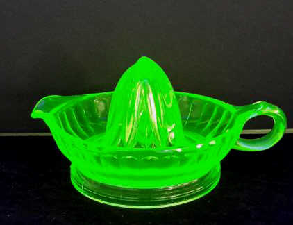 Appraisal: Depression Era Vaseline Glass Reamer Produced by Anchor Hocking Glass