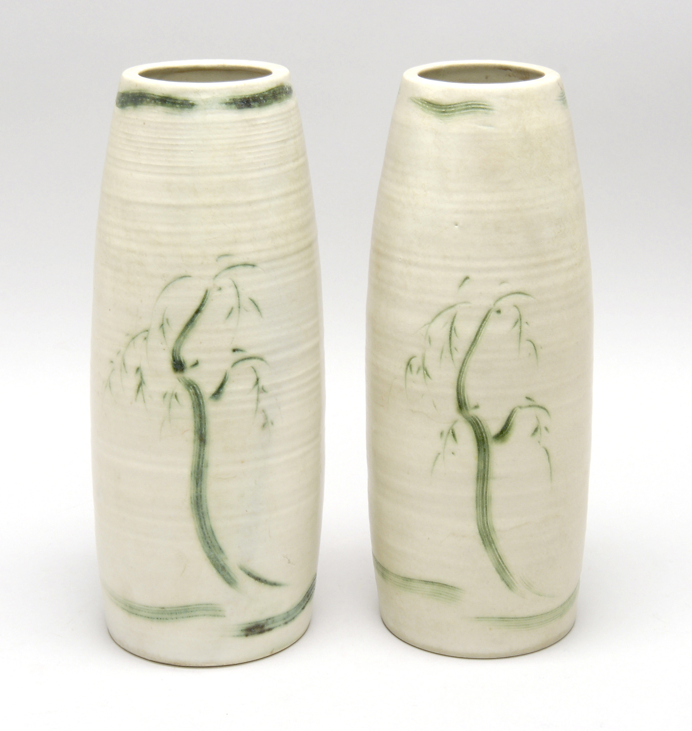 Appraisal: PAIR OF STUDIO POTTERY VASES th CenturyIn seed form with