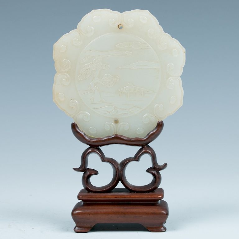 Appraisal: JADE CARVED LOTUS FORM PENDANT AND STAND C The pendant