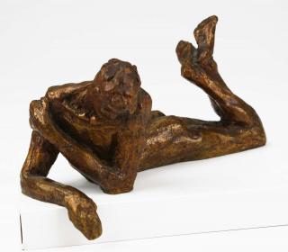 Appraisal: Victor Salmones - signed bronze of man in repose length