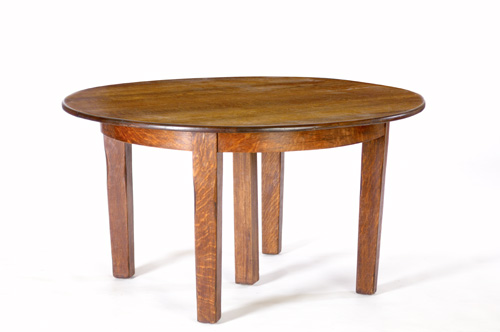 Appraisal: GUSTAV STICKLEY Five-leg dining table with circular top and four