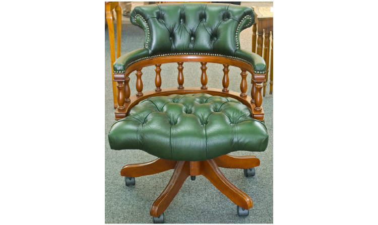 Appraisal: Captains Swivel Leather Chair Mahogany Frame Upholstered In Green Leather