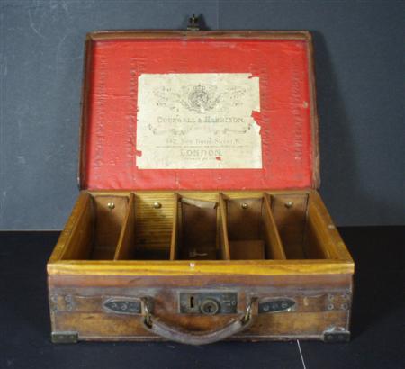 Appraisal: An early th century oak and leather cartridge magazine box