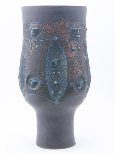 Appraisal: SCHEIER Monumental footed vase incised with faces and figures outlined