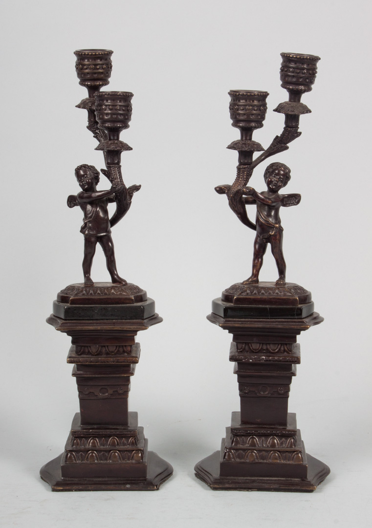 Appraisal: Pair of Rococo style figural candelabra patinated bronze candelabra modeled