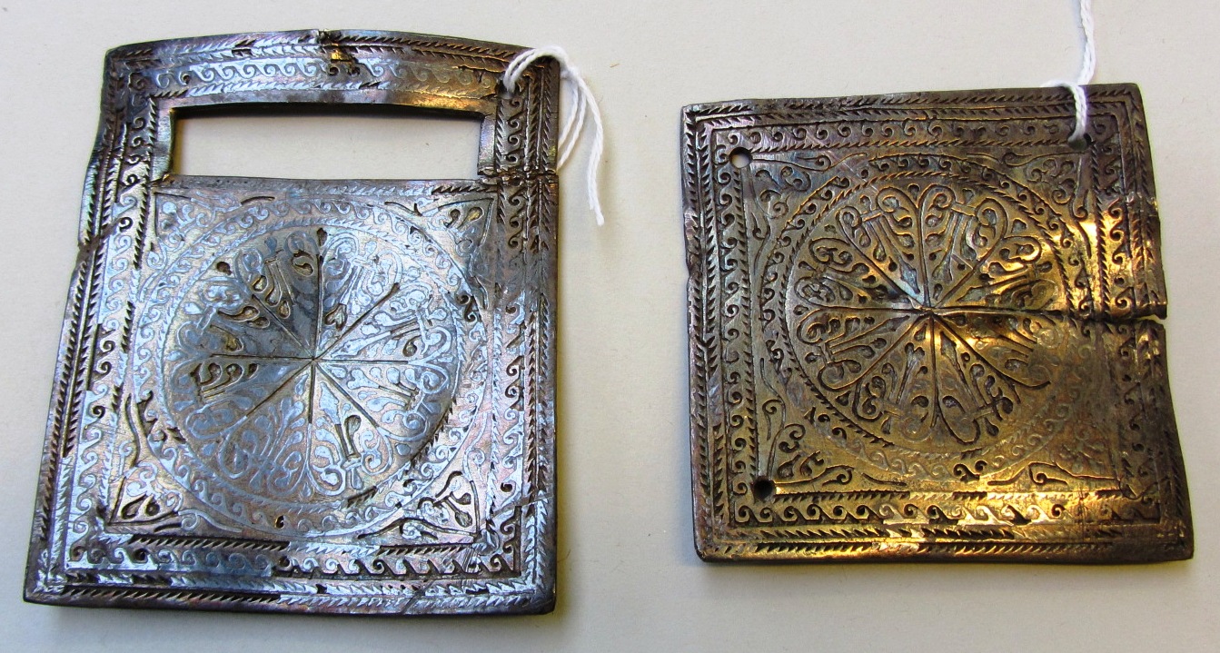 Appraisal: Two flat backed square buckle mounts with silver inlaid decoration