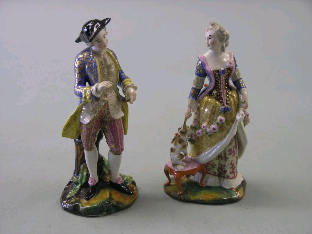 Appraisal: A pair of late th century French porcelain figures gentleman