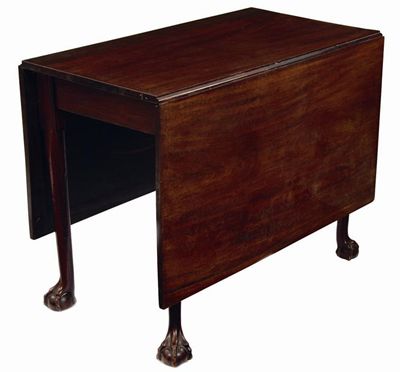 Appraisal: A mahogany drop-leaf table the rectangular top on turned legs