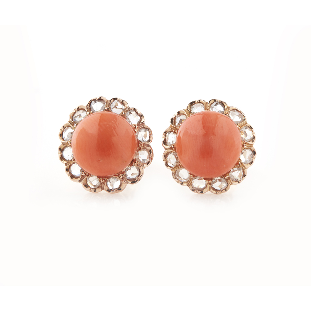 Appraisal: A pair of coral and diamond set earrings each set