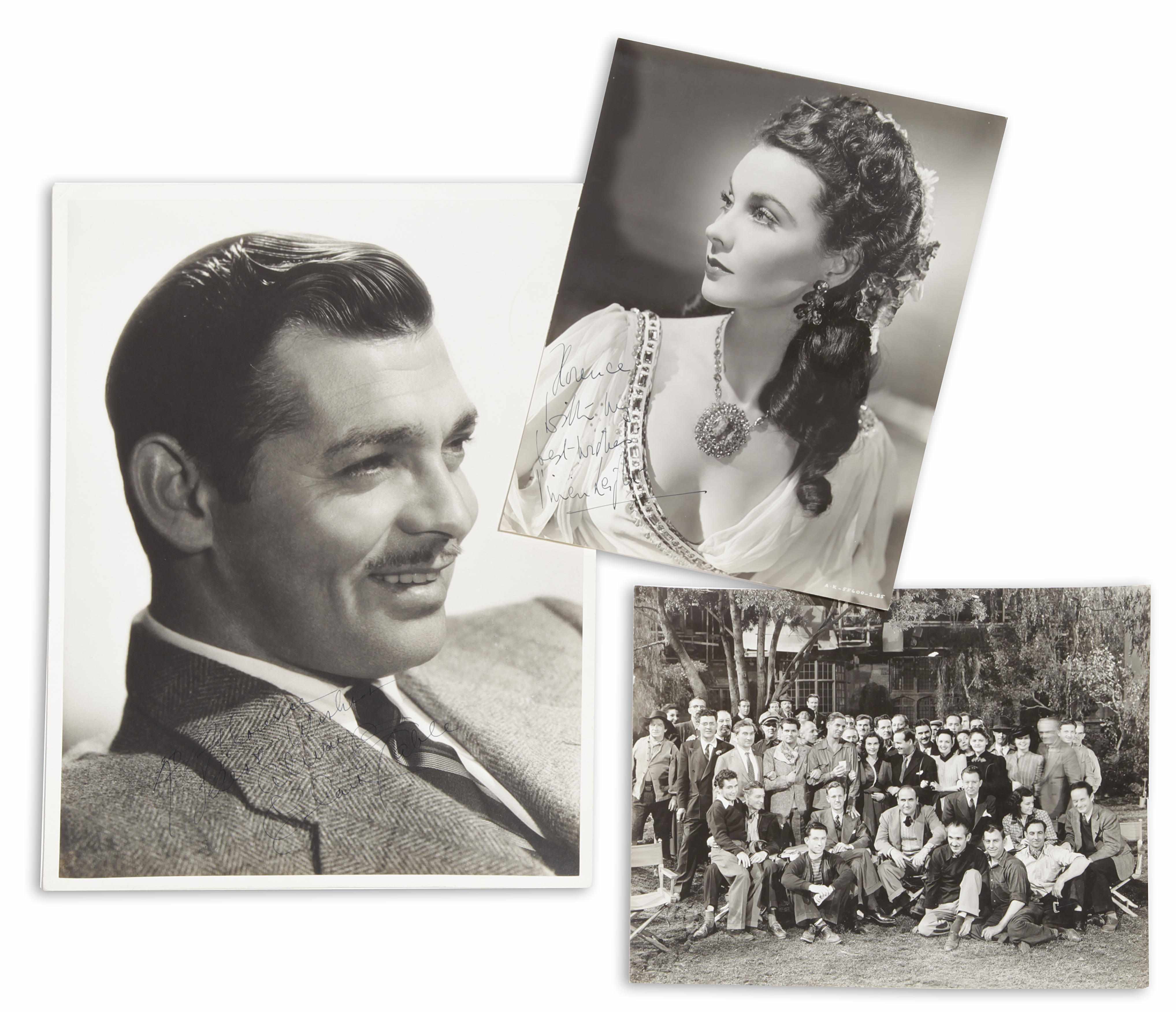 Appraisal: A Clark Gable signed photograph and a Vivien Leigh signed