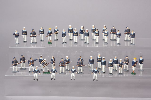 Appraisal: Lot of metal figures representing British Sailors in various positions